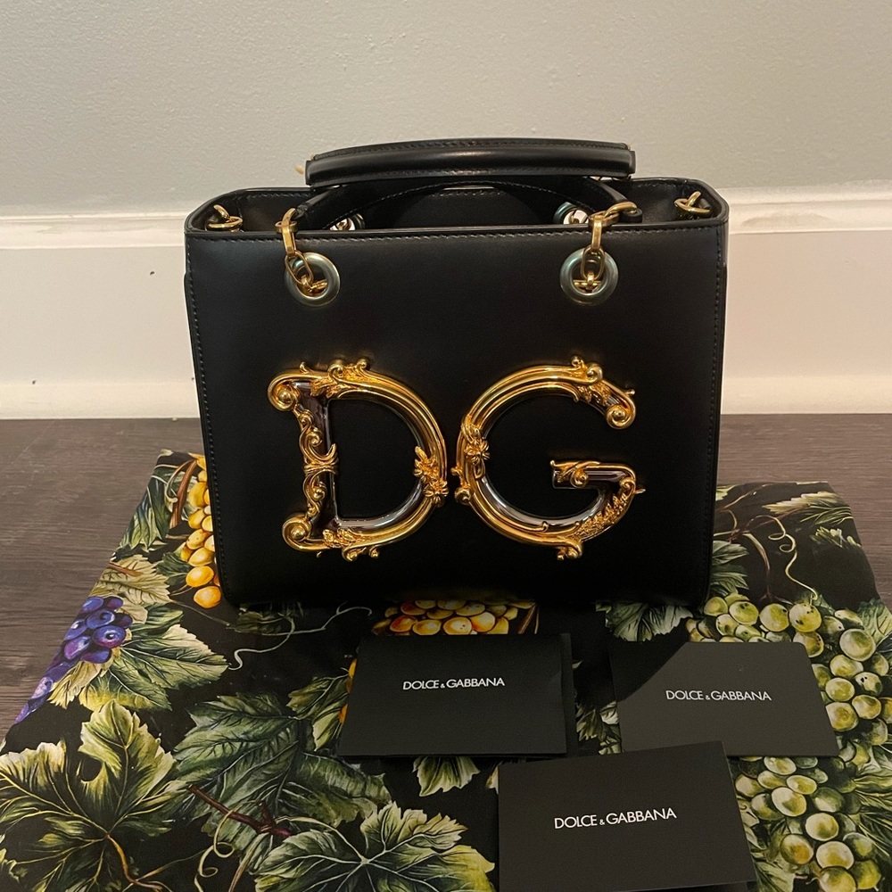 Brand new with Tags, authenticity card & dust bag.